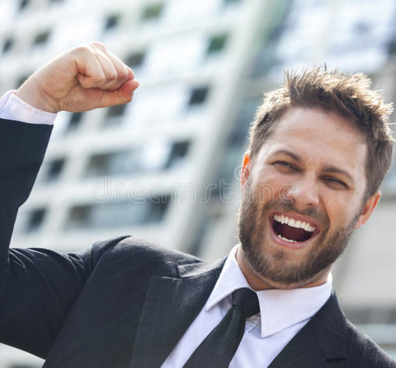 young-successful-business-man-celebrating-city-male-executive-businessman-arms-raised-cheering-shouting-front-high-rise-58760716